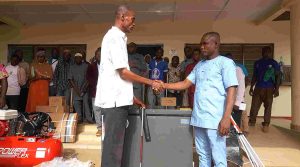 DCE presenting a deep freezer to a beneficiary