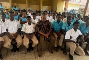 Hon. Prince Razak Tachi photo section with student